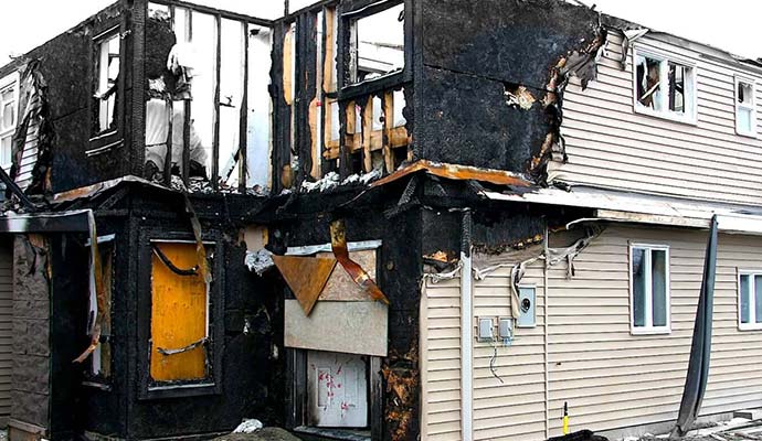 Fire damaged house Fire damaged house