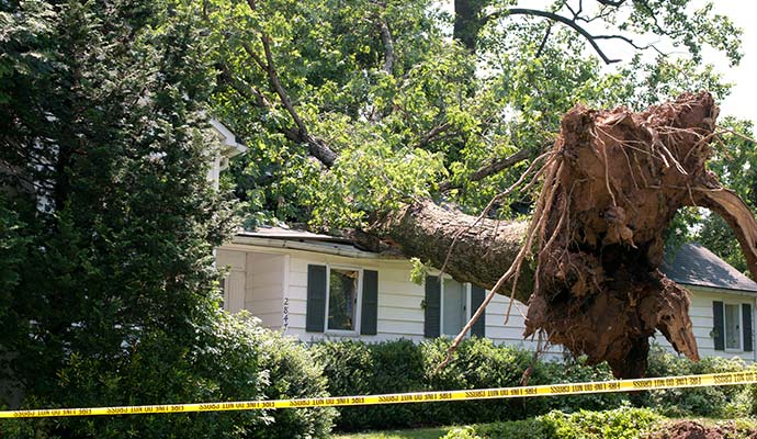 Wind damaged house Wind damaged house